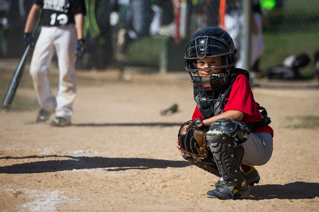 Junior catcher in gear waiting for the pitch
